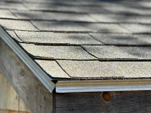 Metal drip edge installation on roof edge
