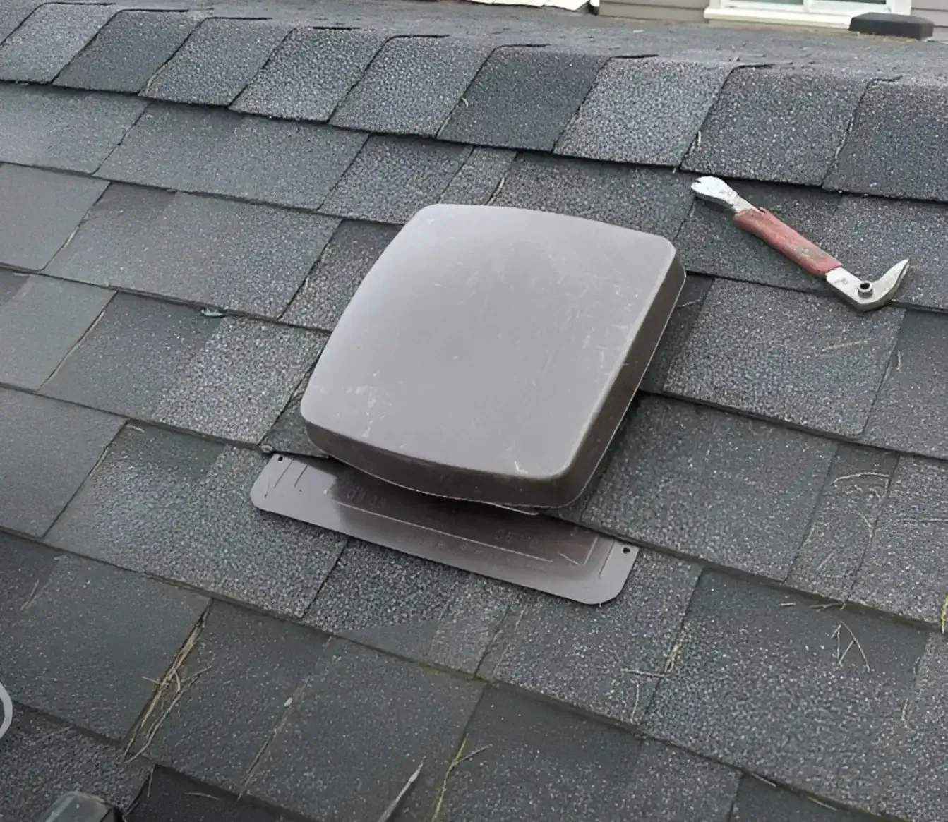 Roof vent repair on an asphalt shingle roof in Vancouver