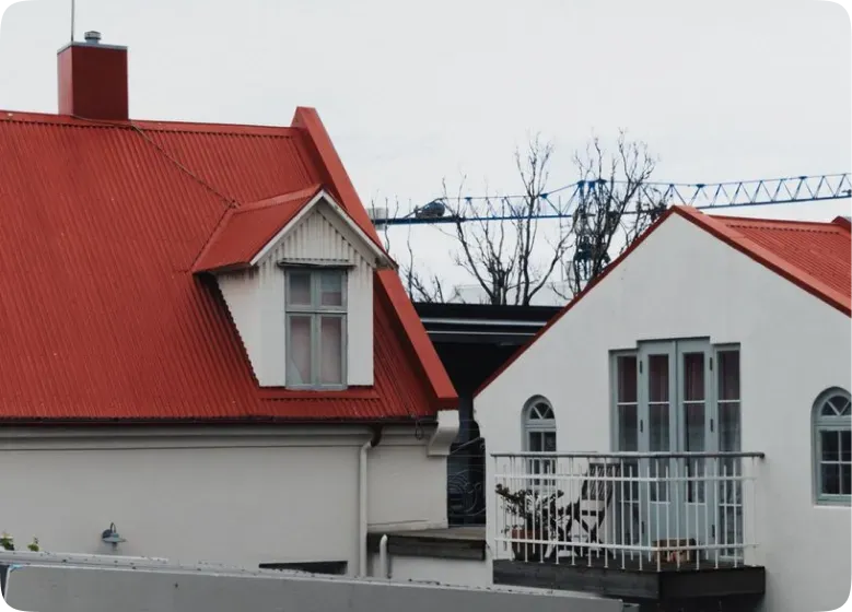 Residential home with red roof waterproofing