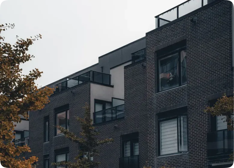Modern strata building with waterproofing systems