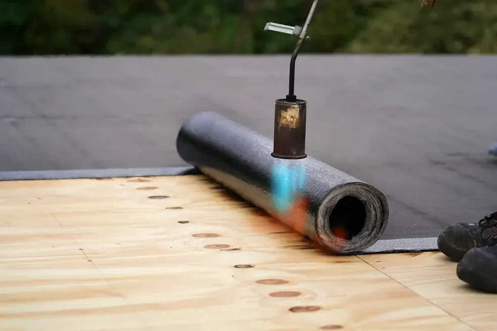 2-Ply Torch-On SBS roofing system being installed