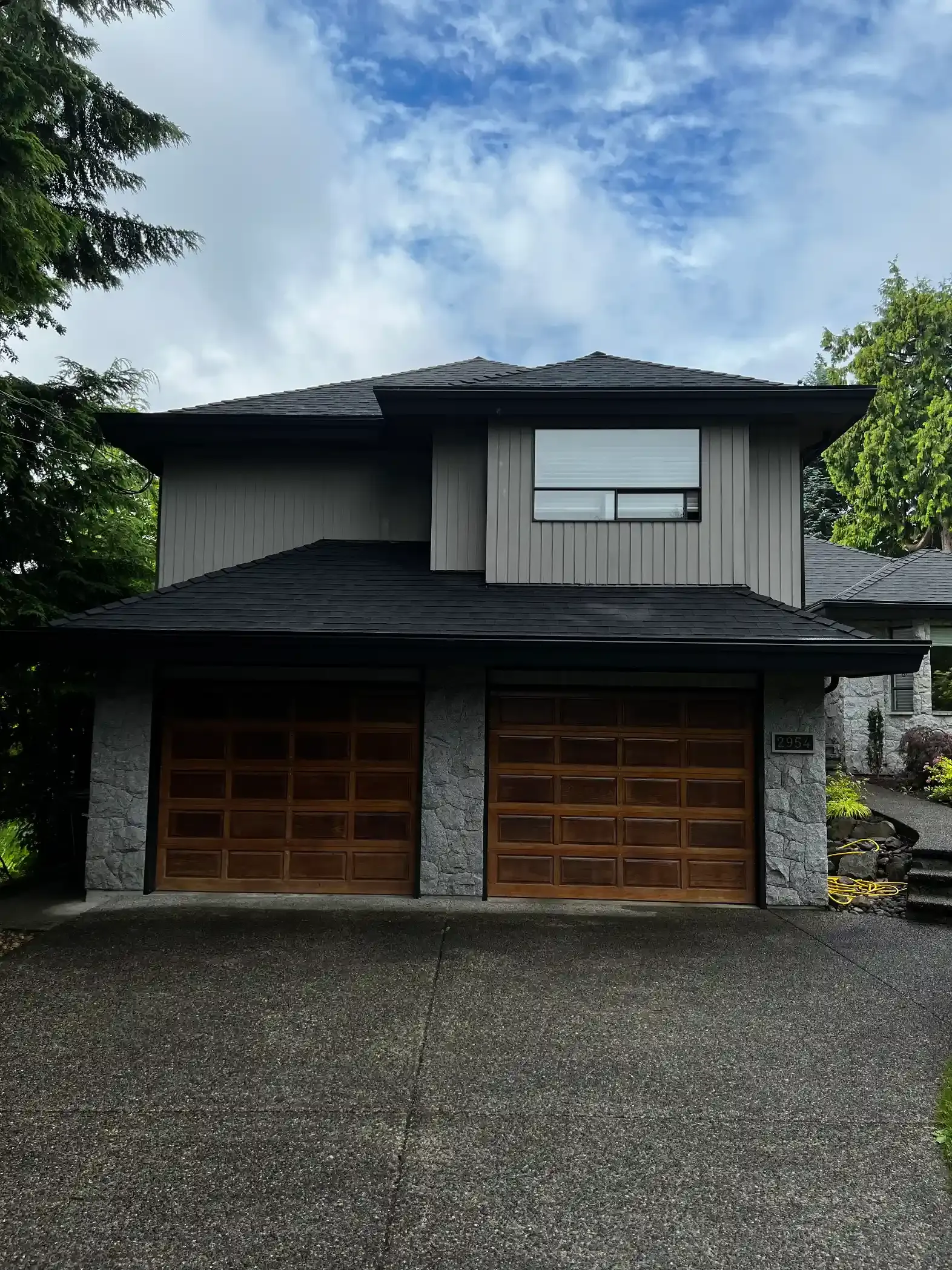 Black roof on modern house designed for year-round performance